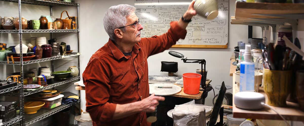 Warren Smith, art teacher at Hampshire Regional High School, works on pottery in the basement studio at the school. Smith is concerned about rising health insurance costs.JOHN TLUMACKI/GLOBE STAFF